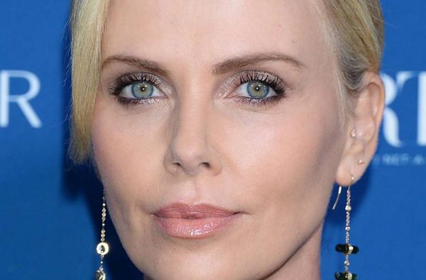 Charlize Theron Stuns Fans with Stunning Mesh Dress at 47!