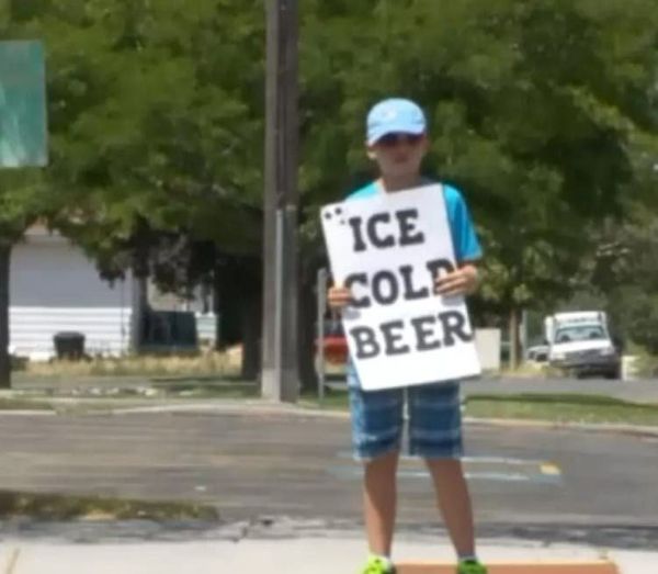 Police Called on Boy Selling ‘Ice Cold Beer’ but His Clever Sign Has Them Laughing