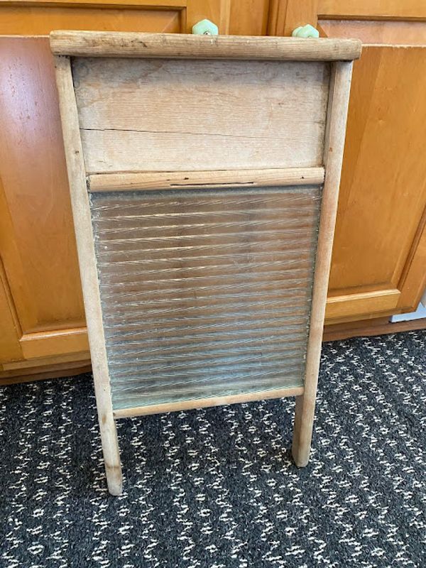 Thrifted Washboard Farmhouse Makeover Photo of a vintage, well-used washboard.