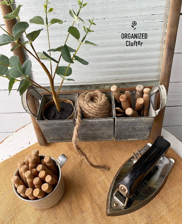 Thrifted Washboard Farmhouse Makeover Photo of an upcycled vintage washboard being staged and accessorized.