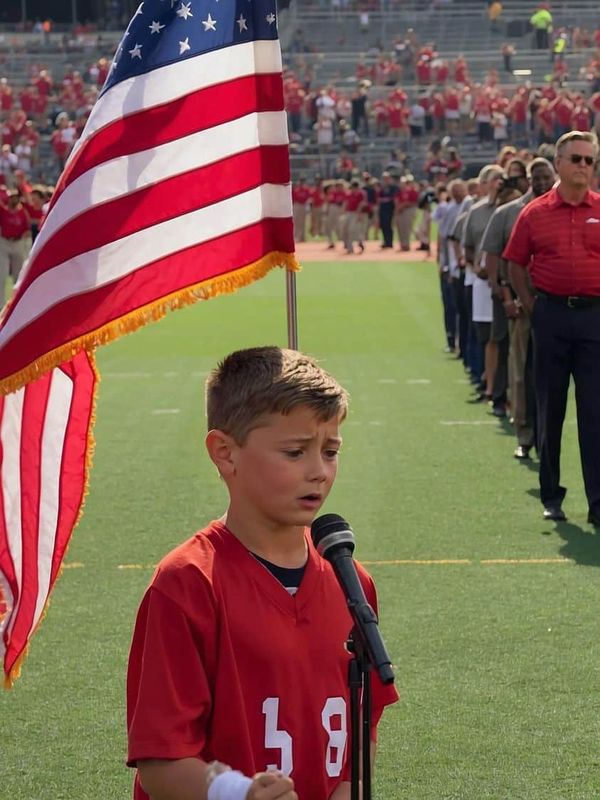 Emotional Impact: 10-Year-Old Wows with National Anthem, Brings Tears to Grown Men