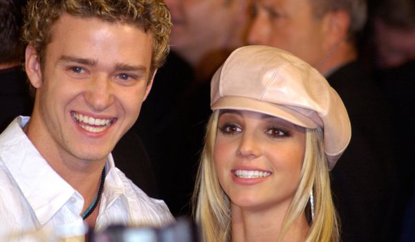 Pop star BRITNEY SPEARS & boyfriend *Nsync star JUSTIN TIMBERLAKE at the world premiere, in Hollywood, of her new movie Crossroads.