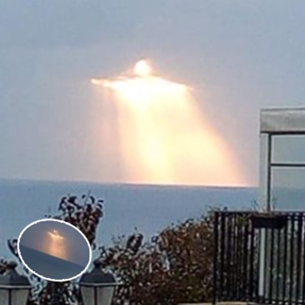 Man Captures Glowing Figure in the Sky: Sign from Above or Mere Coincidence?