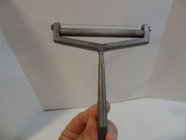 The Mysterious Vintage Presto Aluminum Cheese Slicer