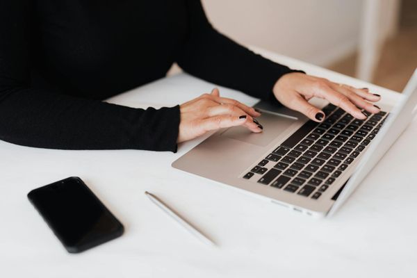 Person typing on laptop | Source: Pexels